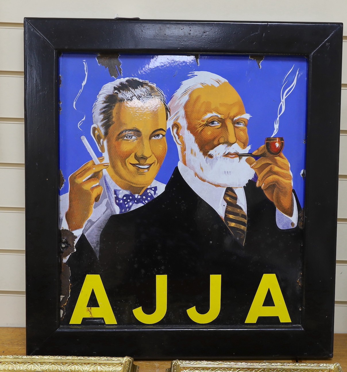 An enamelled advertising sign, AJJA. 72 x 64cm overall